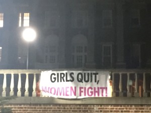 "Girls Quit, Women Fight" banner hung outside Benedict Hall at Sweet Briar College, the night of what the College declared "it's final reunion".